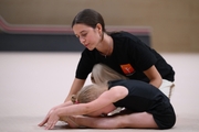 Academy coach Elizaveta Chernova with a young gymnast during the selection process