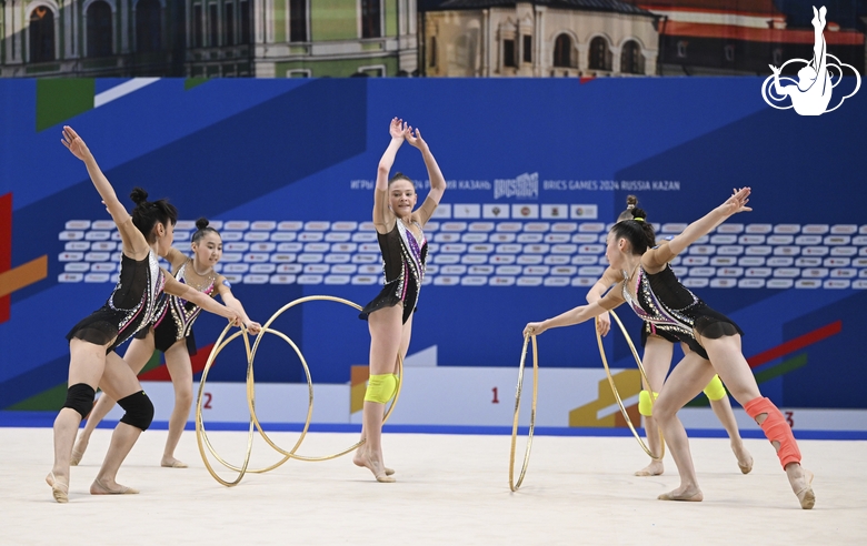 Gymnasts perform exercises with hoops during floor testing before the BRICS Games