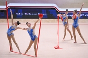 Gymnasts during an exercise with balls and ribbons