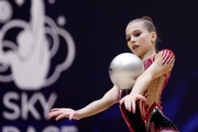 Gymnast during an exercise with a ball