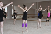 Gymnasts during class at the Academy choreography hall