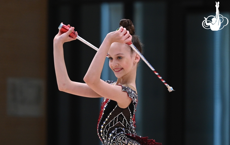 Miroslava Monina during an exercise with clubs