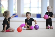 Young gymnasts during training