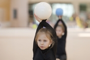 Young gymnasts during training