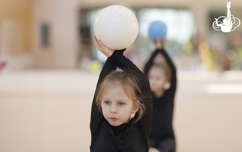 Young gymnasts during training