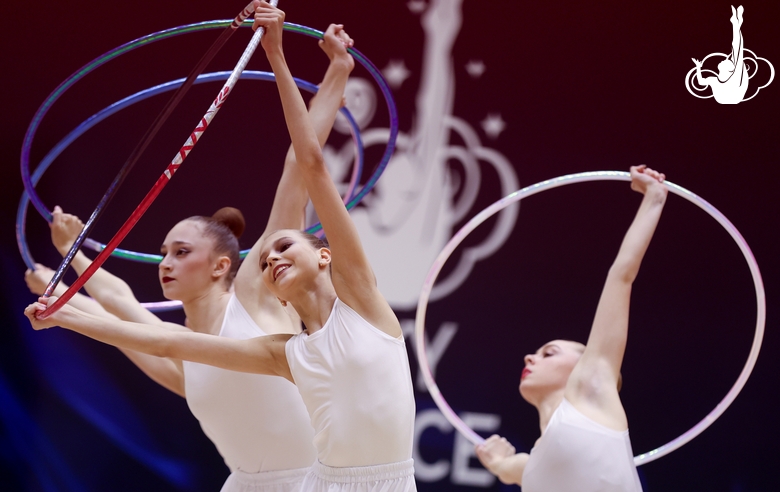 Gymnasts during an exercise with hoops