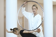 Academy coach Anna Ustsova works with Elvira Belyaeva