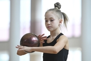 Gymnast during an exercise with a ball