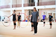 Gymnasts and coach Oksana Skaldina during the recovery camp at the Academy