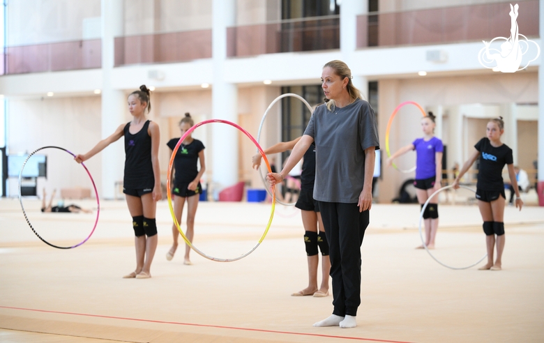 Gymnasts and coach Oksana Skaldina during the recovery camp at the Academy