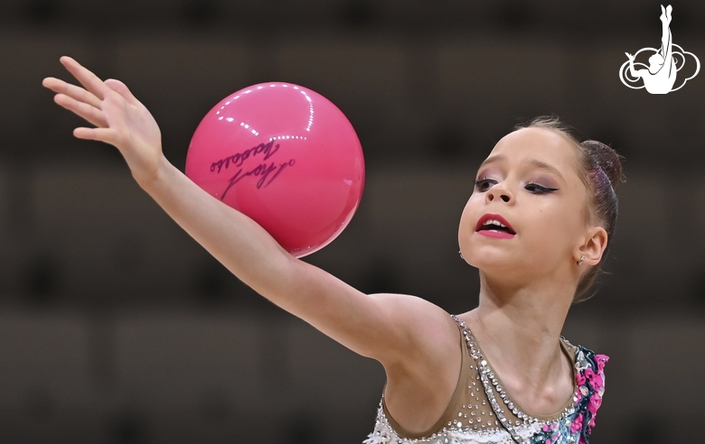 Sofia Bogdanova does an exercise with a ball during an individual program performance