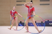 Gymnasts during an exercise with hoops