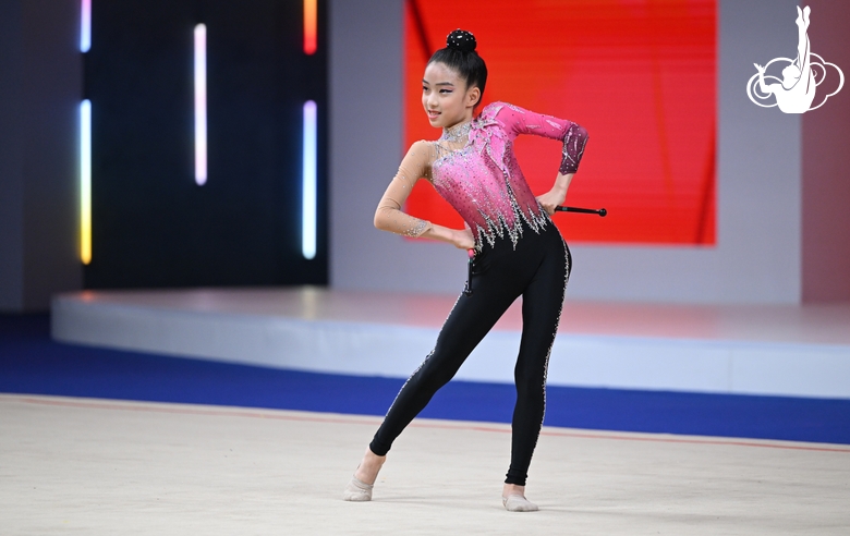 Maria Razorenova during the exercise with clubs A gymnast during the exercise with clubs