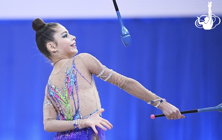 Karolina Tarasova during an exercise with clubs