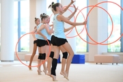 Gymnasts from the Khanty-Mansiysk Autonomous Okrug during an exercise with hoops