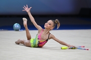 Vasilisa Botkina during the exercise with clubs