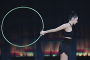 Alina Harnasko during an exercise with a hoop at floor testing