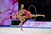 Group team gymnasts from the Ryazan region during an exercise with balls and hoops