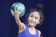 Asel Arapova during an exercise with a ball at floor testing