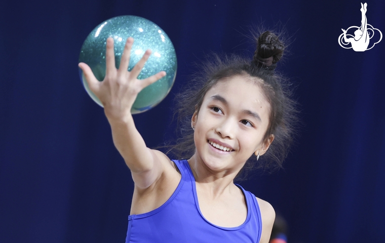 Asel Arapova during an exercise with a ball at floor testing