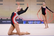 Gymnasts during an exercise with hoops