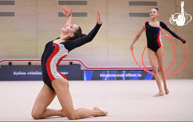 Gymnasts during an exercise with hoops