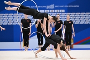 Gymnasts perform exercises with hoops during floor testing before the BRICS Games