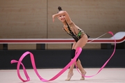 Ksenia Savinova during an exercise with a ribbon at a control training session