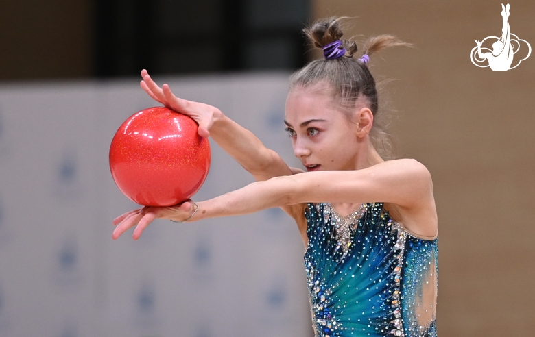 Gymnast during an exercise with a ball during floor testing