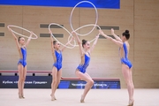 Gymnasts during an exercise with hoops