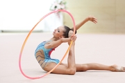 Gymnast during an exercise with a hoop