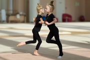 Young gymnasts during training