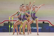 Gymnasts during an exercise with clubs