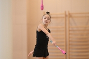 Ksenia Savinova during an exercise with clubs during preparation training for the BRICS Games