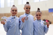 Elvira Belyaeva, Kristina Voitenko and Ksenia Savinova with medals from the Sky Grace Grand Prix tournament