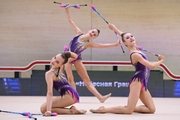 Gymnasts during an exercise with clubs