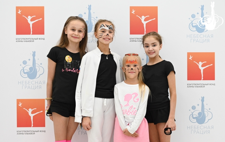 Academy students Yana Zaikina, Elvira Belyaeva, Academy guest and Ksenia Savinova in the photo zone (from left to right)