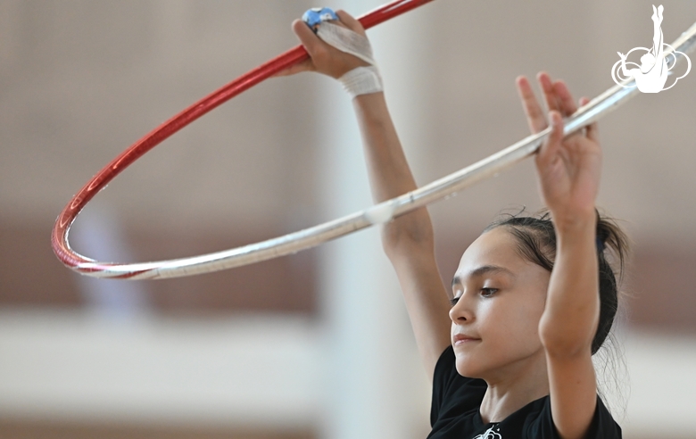 Valeria Medvedeva during exercise with a hoop