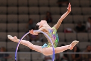 Athena Lifar does an exercise with a hoop during her performance at the Way to Victory tournament