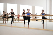 Gymnasts practice choreography during the recovery camp at the Academy