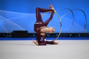 Arina Kovshova during an exercise with a hoop