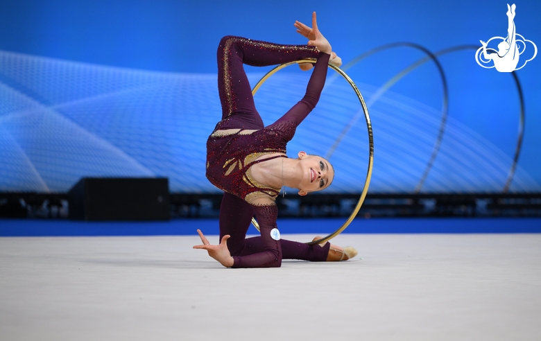 Arina Kovshova during an exercise with a hoop