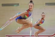 Gymnasts during an exercise with hoops