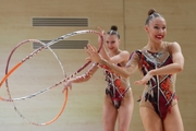 Gymnasts during an exercise with hoops