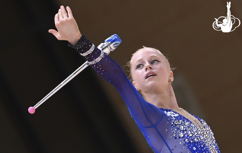 Olga Chernykh during an exercise with clubs at the control training session