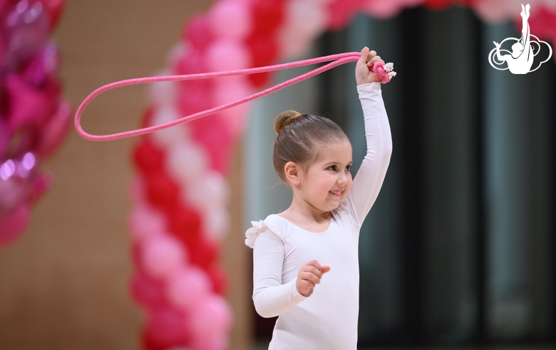 Young gymnast during a rope routine at the mAlinka tournament