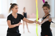 Dina Averina and Karolina Tarasova during the training session in the Academy