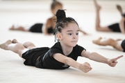 Young gymnast during training