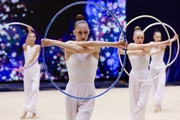 Gymnasts during an exercise with hoops