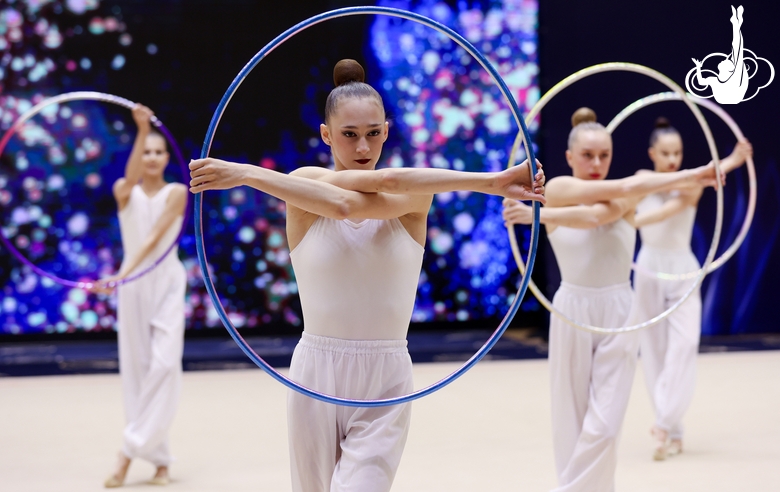 Gymnasts during an exercise with hoops